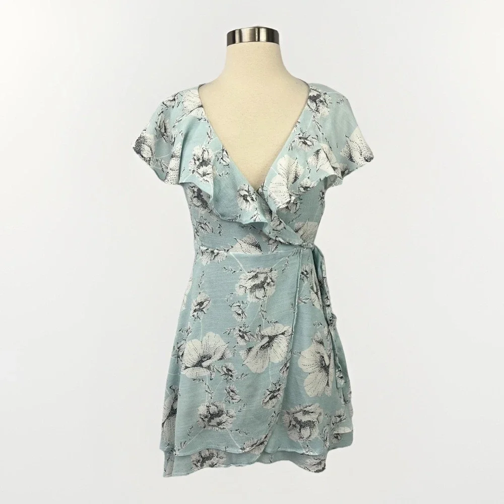 Free People French Quarter Wrap Dress Sz Small Blue White Floral Ruffle Mini